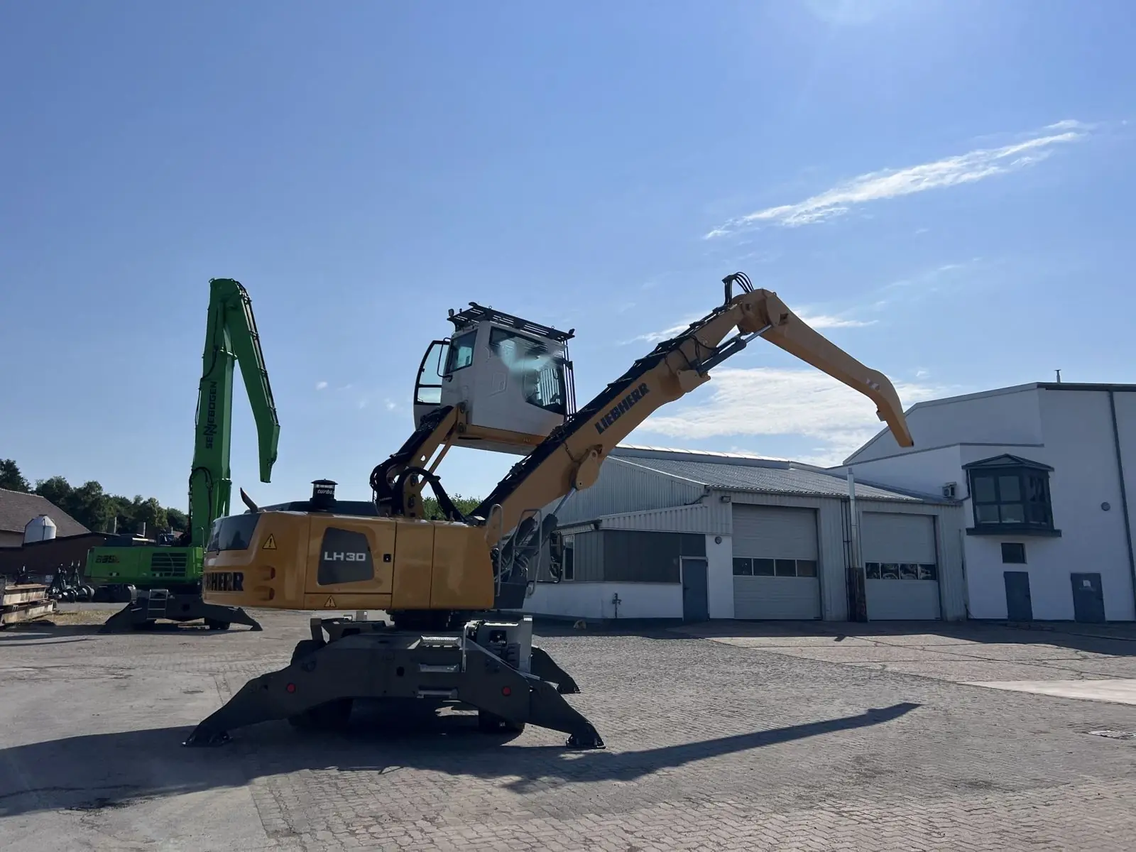 Liebherr LH30 con cabina elevable